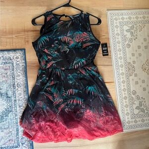 torrid swim dress NWT !!! RARE PATTERN ! 

Black base with Teal & Coral Leaves